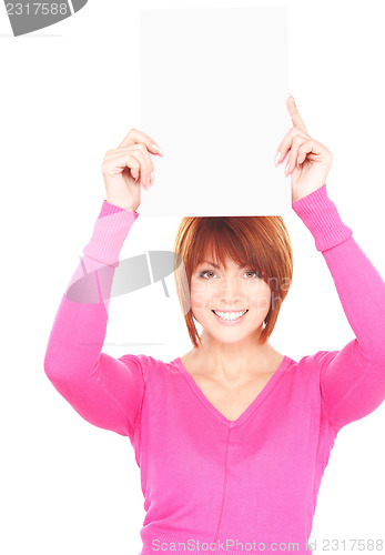 Image of happy woman with blank board 