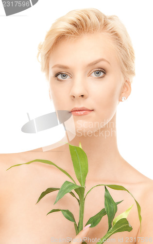 Image of woman with sprout