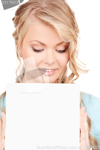 Image of happy woman with blank board