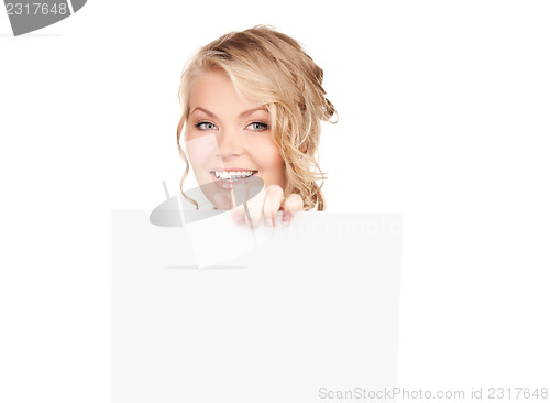 Image of happy woman with blank board