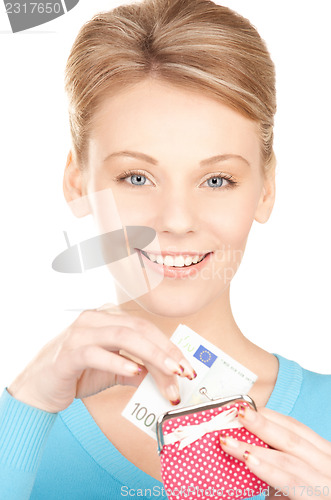 Image of lovely woman with purse and money
