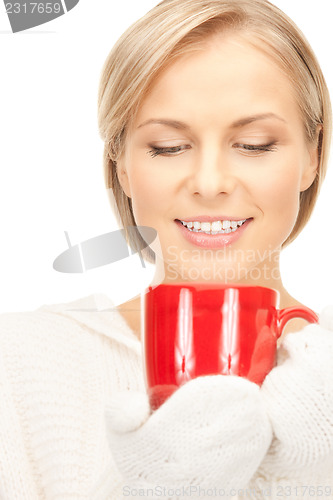 Image of beautiful woman with red mug