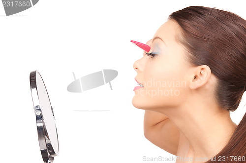 Image of beautiful woman with comb