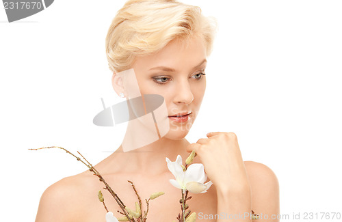 Image of lovely woman with twig