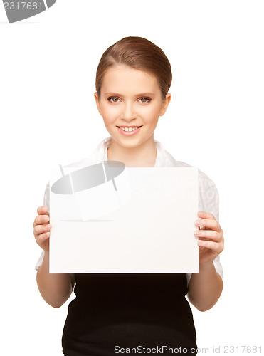 Image of happy teenage girl with blank board