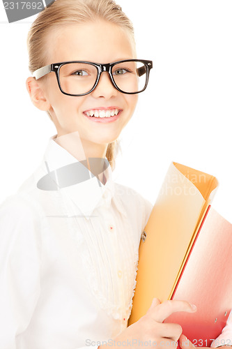 Image of elementary school student with folders