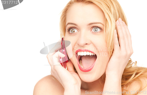Image of happy woman with cell phone