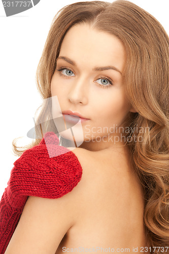 Image of beautiful woman in red mittens 