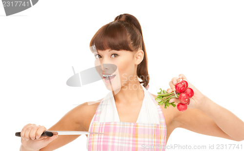 Image of housewife with big knife and radish