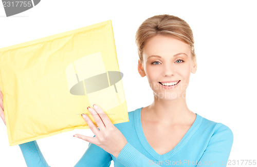 Image of businesswoman with parcel