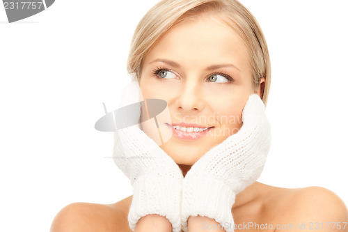 Image of beautiful woman in white mittens 