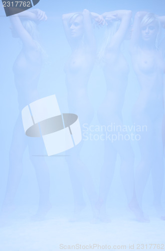 Image of multiple exposure surreal picture of naked woman