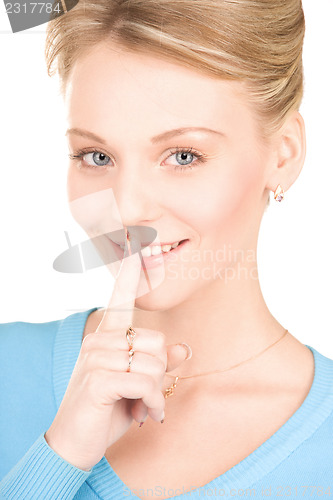 Image of finger on lips