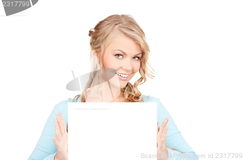 Image of happy woman with blank board