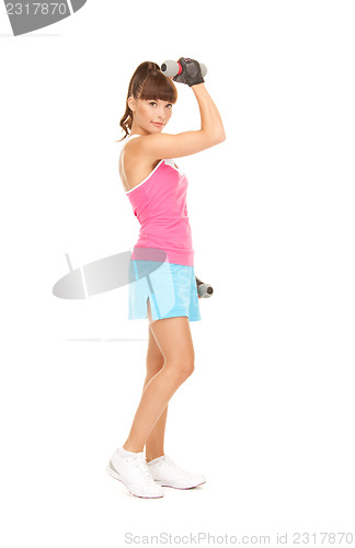 Image of fitness instructor with dumbbells