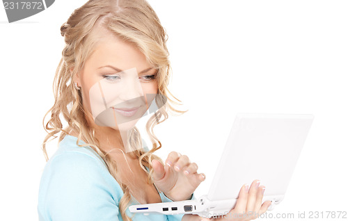 Image of happy woman with laptop computer
