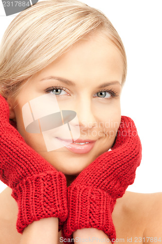 Image of beautiful woman in red mittens 