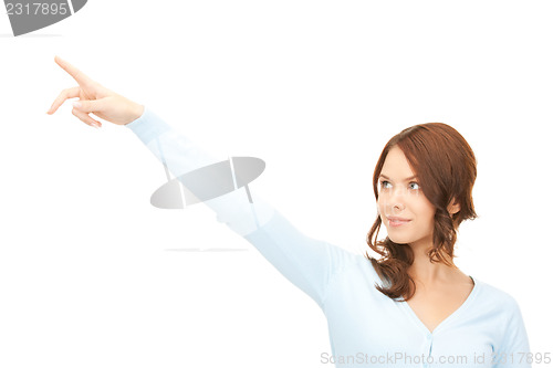 Image of businesswoman pointing her finger