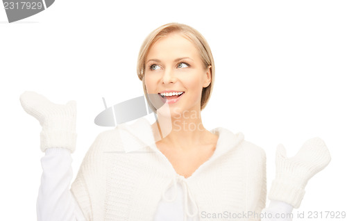 Image of beautiful woman in white sweater 