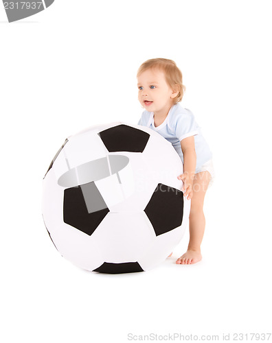 Image of baby boy with soccer ball