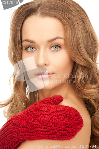 Image of beautiful woman in red mittens 