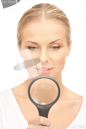 Image of woman with magnifying glass