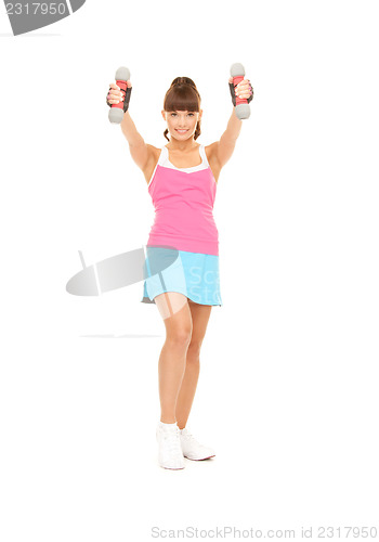 Image of fitness instructor with dumbbells