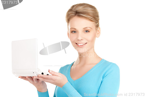 Image of happy woman with laptop computer