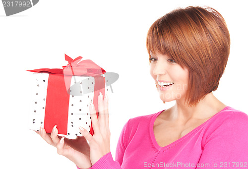 Image of happy woman with gift box