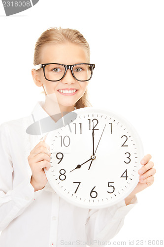 Image of girl holding big clock