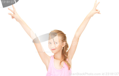 Image of lovely girl showing victory sign