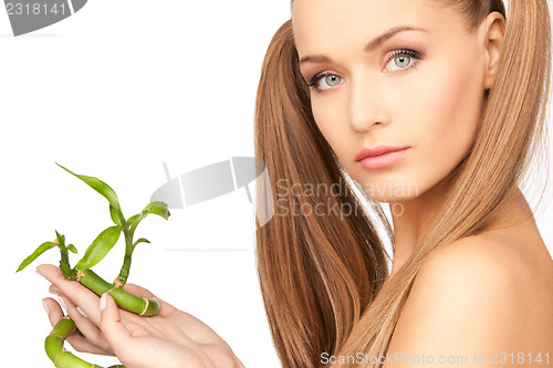 Image of woman with sprout
