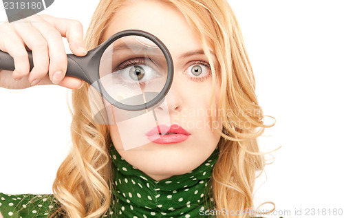 Image of woman with magnifying glass