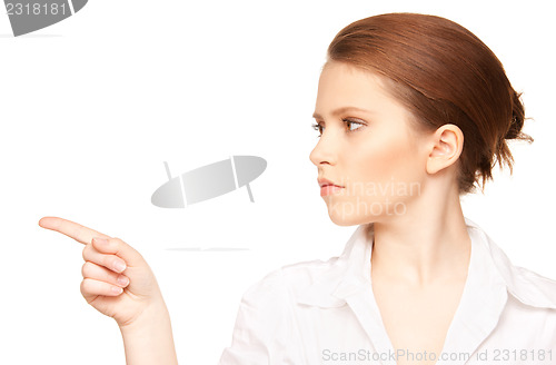 Image of businesswoman pointing her finger