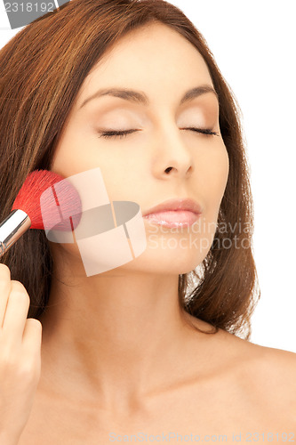 Image of lovely woman with brush