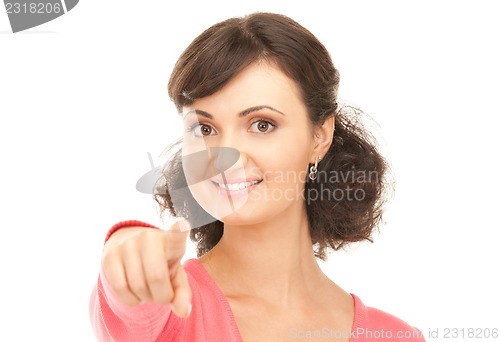 Image of attractive businesswoman pointing her finger