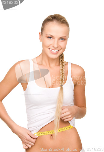 Image of beautiful woman with measure tape