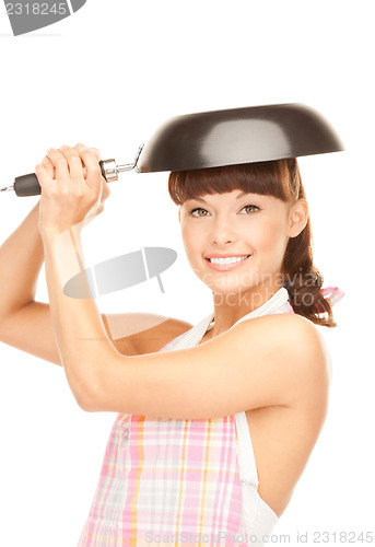 Image of housewife with frying pan