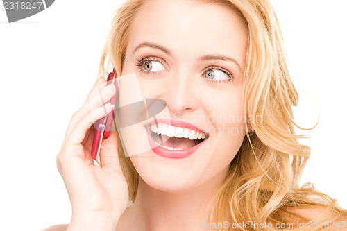 Image of happy woman with cell phone
