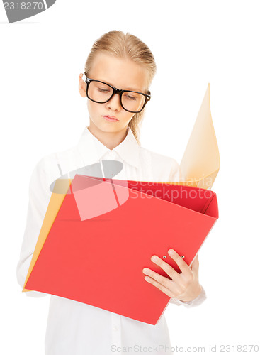 Image of elementary school student with folders 