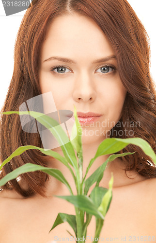 Image of woman with sprout