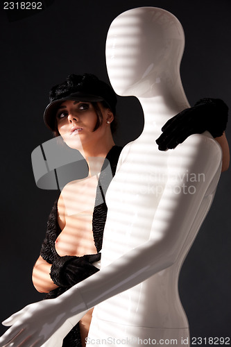 Image of woman with mannequin