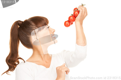 Image of woman with ripe tomatoes