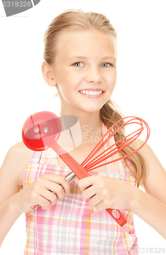 Image of little housewife with red ladle