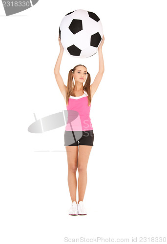 Image of lovely woman with big soccer ball