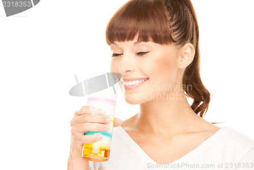 Image of lovely woman with glass of milk
