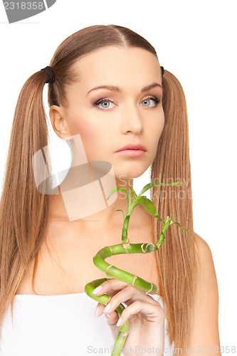 Image of woman with sprout