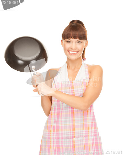 Image of housewife with frying pan