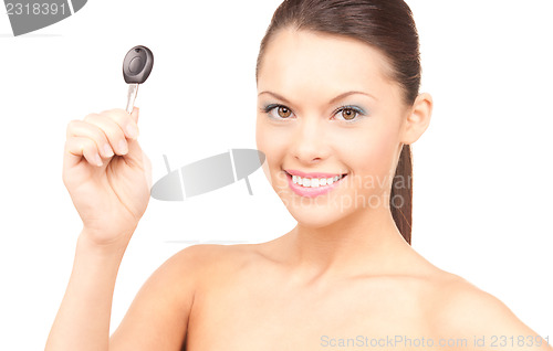 Image of happy woman with car key