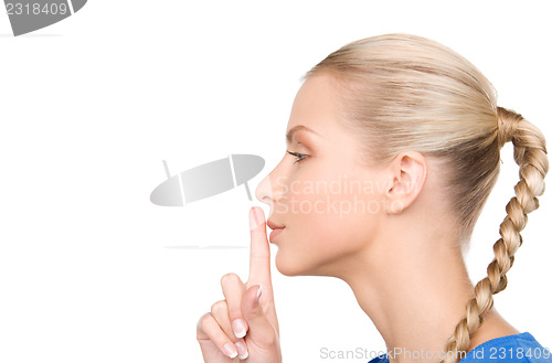 Image of finger on lips